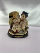 Vintage Marlo Collection Girl and Boy Holding Puppy Figurine 7 inch picture