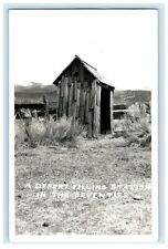 c1970's Desert Filling Station Desert Outhouse Vintage RPPC Photo Postcard picture