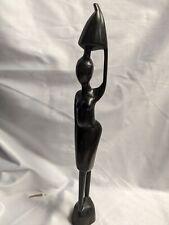 Vintage African wood carving Woman carrying pot picture