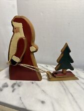 Santa Claus Pulling Tree Solid Wood Figurine Folk Art Hand Made One Of A Kind picture