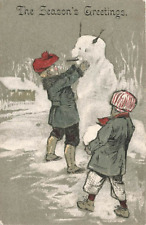 1904 Children building a snowman  Christmas Greetings postcard picture