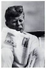 CONTINENTAL SIZE POSTCARD REPRODUCTION OF JOHN F. KENNEDY READING c. 1960 picture