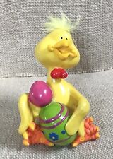 Vintage Kitsch Yellow Duck w Feather Fluff On Head Holding Easter Egg Figurine picture