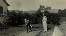 Two Men Playing Shuffleboard In Yard By Mountains B&W Photograph 2.75 x 4.5 picture