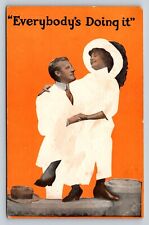  c1914 Man & Woman on Orange Background Everybody's Doing It VINTAGE Postcard picture