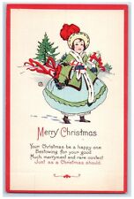 1925 Merry Christmas Girl With Gifts Whreat Winter Scene Lamoni Iowa IA Postcard picture