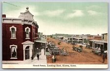 Kiowa Kansas~Main Street Bank~People's Restaurant~Meat Market~Sidewalk Sale~1908 picture