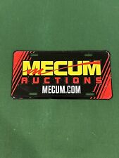 MECUM AUCTIONS ALUMINUM LICENSE PLATE BOOSTER TAG EMBOSSED. picture