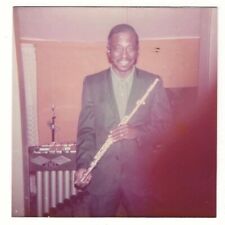 Handsome African American Black Man In Suit Holding Flute Vintage Color Snapshot picture
