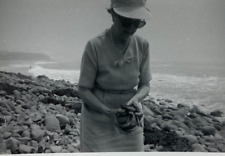 Woman Holding Rocks Standing By Pacific Ocean B&W Photograph 3.5 x 5 picture