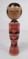 Traditional Craft Kokeshi Dolls Are Characterized By Their Simple Colors Of Red picture