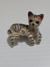Retired Hagen Renaker Cat Lying Paws and Tail Dangling picture