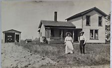 Early 1900's ? RPPC Real Photo Postcard Unposted Couple in Front Of Their House picture