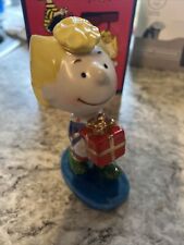 PEANUTS Sally Christmas Present 1998 Flambro Porcelain Figurine Charlie Brown picture