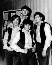 The Monkees classic 1960's pose with the guys in matching outfits 8x10 photo picture