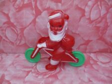 Vintage Christmas Rosbro Santa Claus on Bike Plastic Candy Container picture