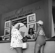 Acapulco Mexico Two women check Aeronaves De Mexico airlines A- 1952 Old Photo picture