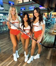 HOOTERS GIRL - 3 BEAUTIES WITH A HOCKEY STICK  picture