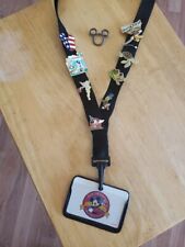 Walt Disney Bling, lot of 9 Pins with Lanyard & badge. 75yr, PortOrleans, Tink. picture