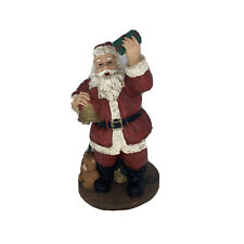 Santa Figure With Bell Christmas Tree And Gifts￼ Presents Toys In Santa’s Bag picture