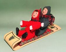 Byers Choice LTD Two Toddlers on Toboggan Red and Green Snow Suits, 1992 picture