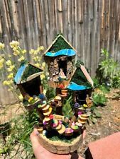 Miniature Fairy House Fully Decorated and Has Lights Sprinkled With Fairy Love picture