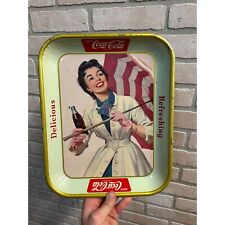 1957 COCA COLA SERVING METAL TRAY MADE IN OHIO UMBRELLA GIRL FRENCH CANADIAN picture