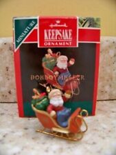 Hallmark 1990 Santa's Journey sleigh Miniature Christmas Ornament picture