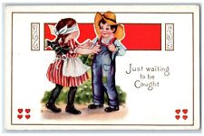 c1910's Valentine Boy Girl Blindfold Playing Hearts Embossed Antique Postcard picture