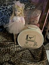 Porcelain Ballerina With Antique Suitcase picture