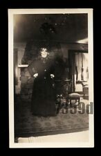 Creepy Old Snapshot Woman Wearing Halloween Mask in Dark Room VTG Photo picture