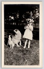 RPPC Cute Girl with Dog White Kitten And Flower Bouquet Real Photo Postcard T22 picture