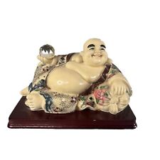 Vintage Lying Down Buddha Holding Ball Collectible  picture