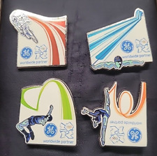 LOT OF 4 2012 LONDON GE CYCLING SWIMMING GYMNASTICS HIGH JUMP OLYMPIC PIN picture
