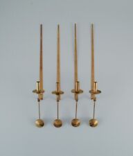 Skultuna, Sweden, four brass candlesticks for wall hanging. picture
