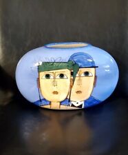 Large Whimsical Blue Pot With Faces. picture