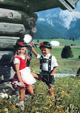 VINTAGE CONTINENTAL SIZE POSTCARD YOUNG BOY AND GIRL FULL AUSTRIAN TRADITIONAL picture