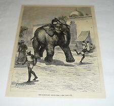 1878 magazine engraving ~ MAN RIDING ELEPHANT THROUGH A CITY picture