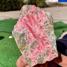 457G Mineral specimens of natural rhodochrosite coexisting with purple fluorite picture