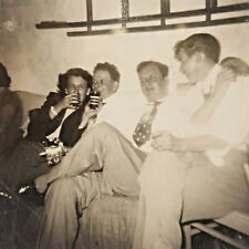 Vintage B&W Photo Men and Woman Drinking at Risqué Cocktail Party  picture