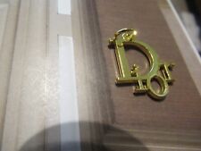 DIOR ZIP PULL   21x23 MM A CLEAN  gold tone,   THIS IS FOR 1 picture