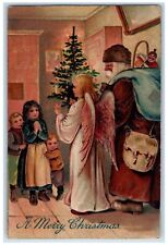 c1910's Christmas Tree Angel Brown Rove Old World Santa Sack Of Toys Postcard picture