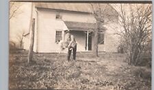 MAN THROWING PET DOG real photo postcard rppc collie backyard candid fun moment picture