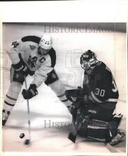1994 Press Photo Admirals' Gino Cavallini controls puck near Minnesota goalie picture