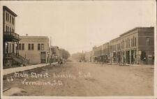 RPPC Vermillion,SD Main Street Looking East Clay County South Dakota Postcard picture