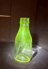 Vintage Clear Glass Welch's Juice Mini Bottle, has a Green Manganese Glow picture