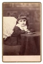 LITTLE GIRL AND A PHOTOGRAPH ATOP A TABLE : LANCASTER, NEW HAMPSHIRE picture