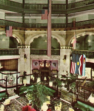 BROWN PALACE HOTEL LOBBY WITH FLAGS DENVER COLORADO CO 1959 💥 VINTAGE POSTCARD  picture