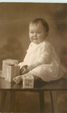 C-1910 Baby building blocks Vincent Mitchell RPPC Photo Postcard 22-8996 picture