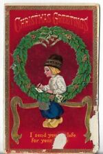 VTG Christmas Postcard - 1913 Dutch Boy Writing Wreath Not Perfect picture